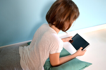 Girl student online learning class study online video call zoom teacher, Happy girl learn english language online with laptop at home. New normal. Social distancing. stay home . High quality photo