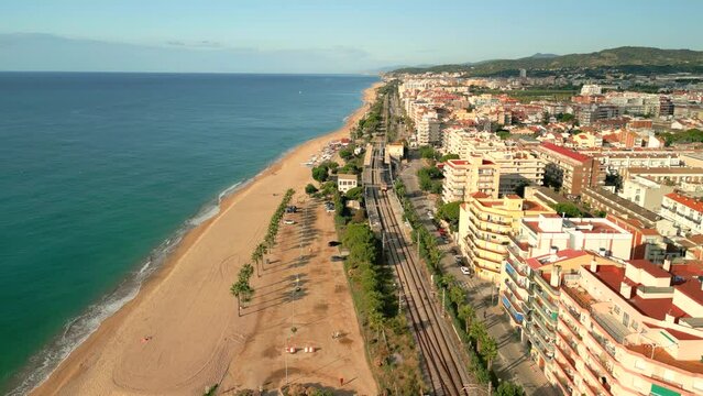 Calella Pineda de Mar Santa Susanna Costa del Maresme aerial images of the beach Images about the train of Rodalies beach and buildings