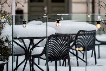 outdoor restaurant terrace covered with snow