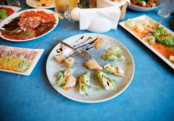 Banquet in the restaurant, serving tables, appetizers, sets