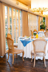 Banquet in the restaurant, serving tables, appetizers, sets