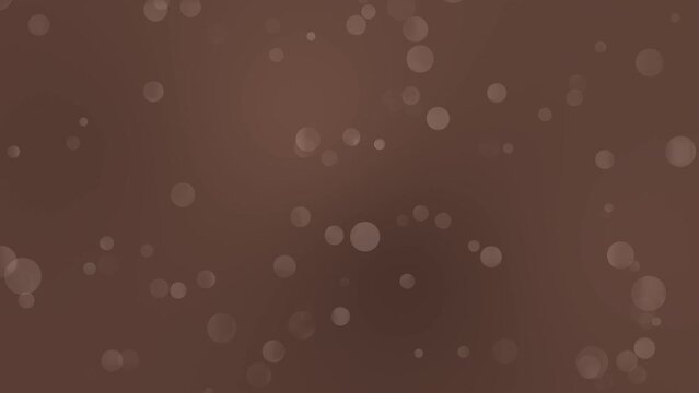 Chocolate sprinkle, hickory plank, bright brown and peat moss bokeh gradient background loop motion. Moving bubbles colorful blurred animation backdrop. Floating circles with soft color transitions. 