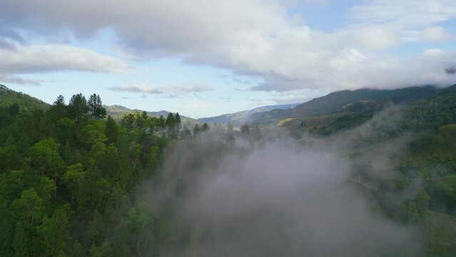 A cinematic shot of a hill with fogs in Malaybalay Bukidnon Philippines
