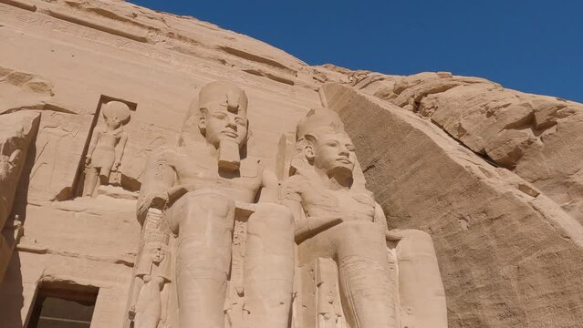 Colossal statues of Ramses at Abu Simbel, historic site with two massive rock-cut temples, Egypt 