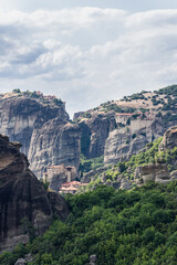 Fototapeta na wymiar Vertical photo of Monasteries of Meteora on top of these rocks make up the second most important monastic community in Greece