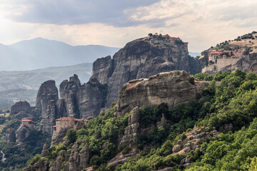 Fototapeta na wymiar View of the Meteora valley with impressive rock formations and 4 famous monasteries. Kalambaka, Greece