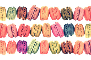 Rows of colorful macarons isolated on trnasparent background