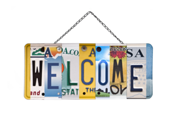 Welcome sign created with used recycled license plates isolated on trnasparent background