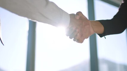 Handshake, meeting and b2b with a business man and woman shaking hands in an office boardroom. Team, crm and thank you with a male and female employee working in collaboration or partnership