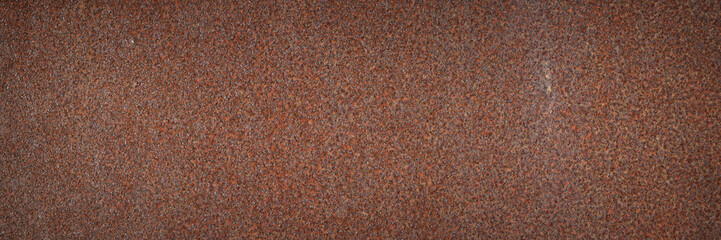 Old rusty metal texture. Rust on the surface of the iron wall. Panoramic background for grunge design.