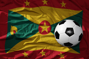 vintage football ball on the waveing national flag of grenada background. 3D illustration - obrazy, fototapety, plakaty