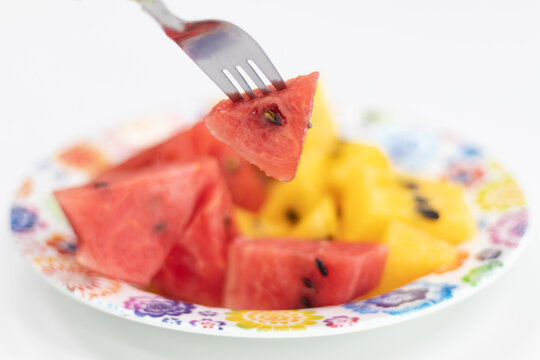 Watermelon Being Stabbed With A Fork