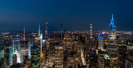 Night panoramic aerial view of New York skyscrapers on Manhattan island