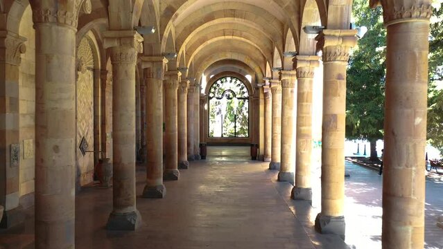 Mineral water resort town in Jermuk, Armenia, Drinking gallery with mineral water in Jermuk, Armenia, Caucasus. Waters Pavillion.  Interior public building with classical columns.