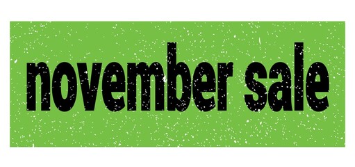 november sale text written on green-black stamp sign.