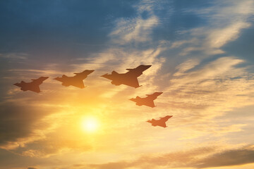 Air Force Day. Aircraft silhouettes on background of sunset or sunrise.