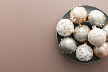 Christmas balls on powdery background, Merry Christmas and Happy New Year concept, top view, copy space