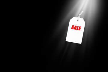 white tag with the inscription sale on a black background