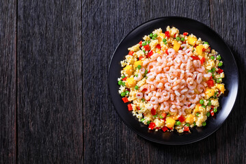 shrimps and millet pilaf with mango and veggies