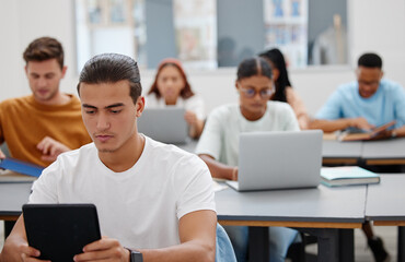 University, students and learning with laptop or tablet for digital notes in education auditorium. Concentration, focus and dedication of college people in classroom typing lesson memo and guidance.