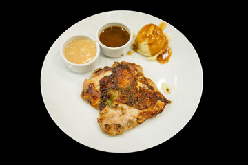 Top view of Chicken Steak with Black Pepper on a white plate, focus selective