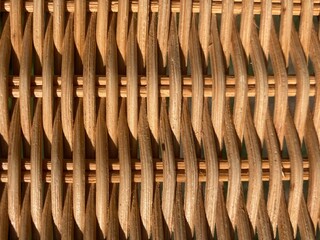 a beige braided rattan pattern