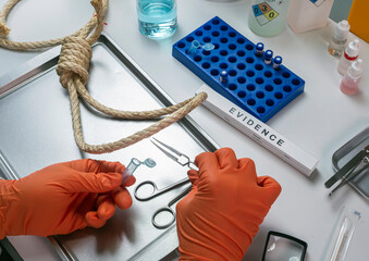 Police scientist extracts DNA sample from hanging victim's body, crime lab analysis, conceptual...