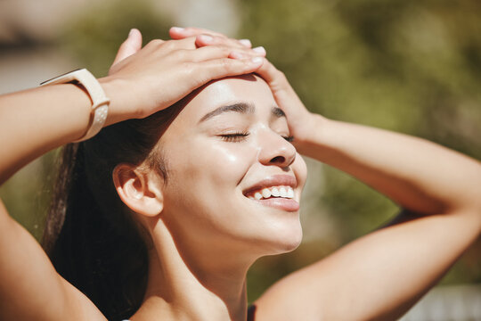 Face, relax and happy woman in sunshine, outdoor fresh air and peaceful break for mental health, wellness and body. Summer, happiness and smile latino girl relax in nature, park rest and calm freedom