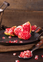 A fresh fruit rich in vitamins, pomegranate