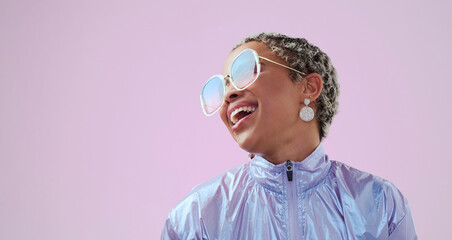 Happy black woman, beauty and fashion sunglasses, retro and cool vintage look. Model, female and unique style, costume or designer jacket outfit and jewelry isolated on pink studio mockup background.