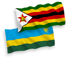 Flags of Republic of Rwanda and Zimbabwe on a white background