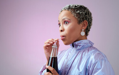 Cola, wow and black woman with surprise from drink in bottle against a pink mockup studio...