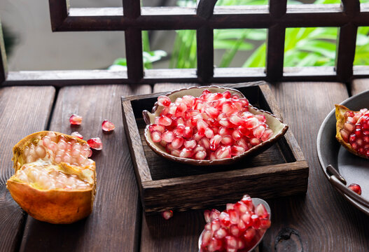 A fresh fruit rich in vitamins, pomegranate