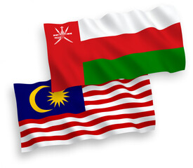 Flags of Sultanate of Oman and Malaysia on a white background