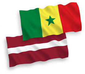 Flags of Latvia and Republic of Senegal on a white background