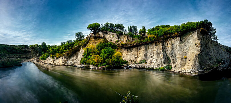 3D illustration. Beautiful cliff with river and trees with dramatic design background