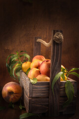 nectarines in a wooden box
