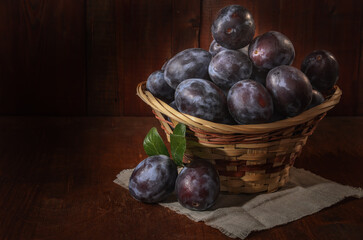 ripe plum in a basket