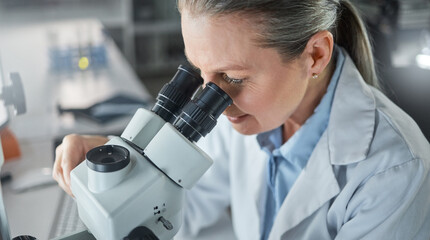 Science, research and microscope with a woman engineer working in her laboratory on innovation and development. Analytics, future and sample with a scientist at work with DNA or RNA in her lab