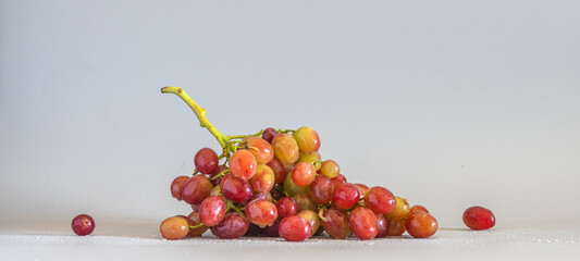 Still life with a bunch of ripe and tasty grapes.