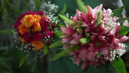 Closeup two colorful beautiful bouquet of flower arrangements made at Flower Shop by professional for valentines