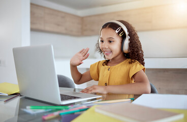 Education, laptop and girl learning a virtual class from her kindergarten teacher via an educational online website. Video call, homeschooling and happy student in headphones waving at tutor teaching - obrazy, fototapety, plakaty