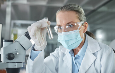 Covid lab, medical science and scientist working on futuristic medicine research for healthcare at a pharmacy. Doctor doing an expert chemical test on liquid for innovation while at a hospital