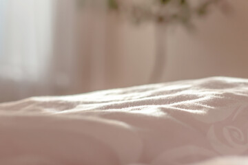 view of the morning crumpled bed in the hotel room. in the morning light. Cozy morning atmosphere.   Shallow depth of field. Selective focus. color 2022 - 536057760