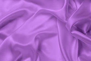 Part of the fabric texture of the fabric for the background and decoration of the work of art, a beautiful crumpled pattern of silk or linen. A crumpled piece of cloth