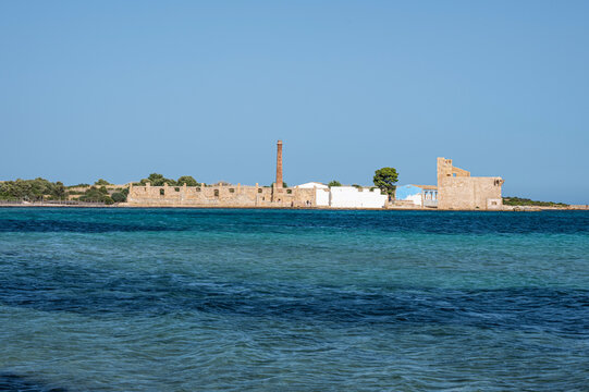 The beach of Vendicari with the old tonnara in the background