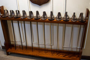 Many rapiers in the row - battle swords on the warship of 18 century - sailors soldiers