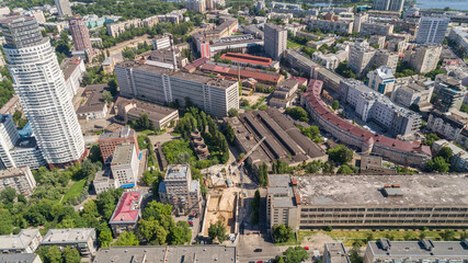 Aerial view building former factory Arsenal. Drone shot beautiful Kyiv Kiev cityscape on a sunny summer day. Capital of Ukraine. Construction