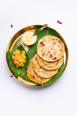 Puran poli, Puran roti, Holige, Obbattu, or Bobbattlu, is Indian sweet flatbread from Maharashtra