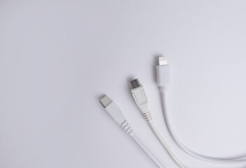 White mobile phone usb mobile charging cable on white background.